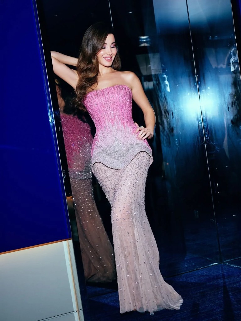 Nancy Ajram in a pink mermaid gown
